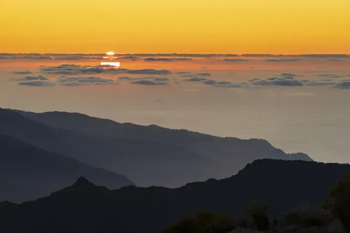 Framed Print : Burning sky at sunset over the Atlantic Ocean and silhouettes of mountains from Pico Framed Print : Burning sky at sunset over the Atlantic Ocean and silhouettes of mountains from Pico