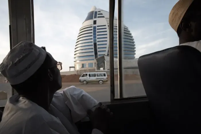 Framed Print : A bus passes the 5-star Boji Al-Fateh Hotel (Libyan Hotel) Framed Print : A bus passes the 5-star Boji Al-Fateh Hotel (Libyan Hotel)