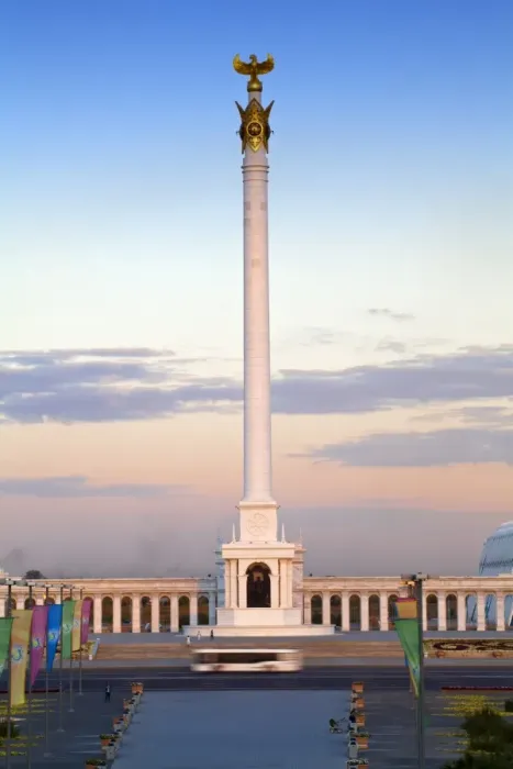 Framed Print : Bus passing KazakYeli monument (Kazakh Country) at dusk, Astana, Kazakhstan, Central Asia, Asia