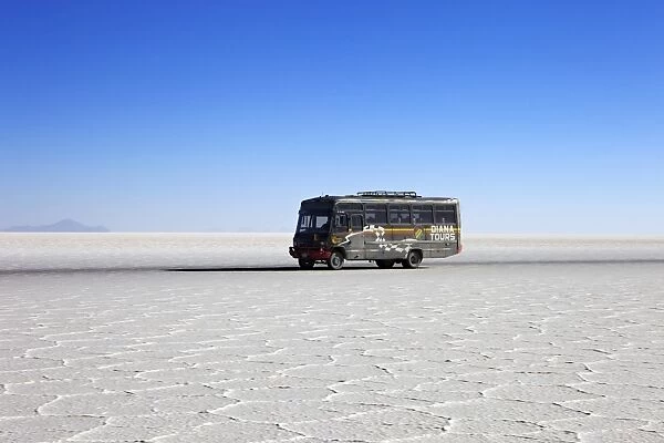 Bus on Salar de Uyuni, the largest salt flat in the world, South West Bolivia, South America