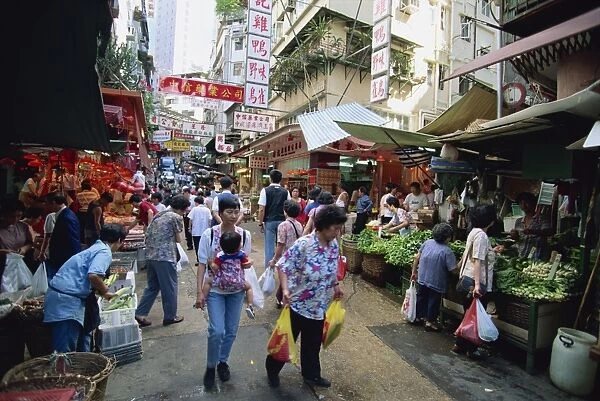 A busy market in Chinatown, a slice of old Hong Kong in Central, the business centre of Hong Kong Island