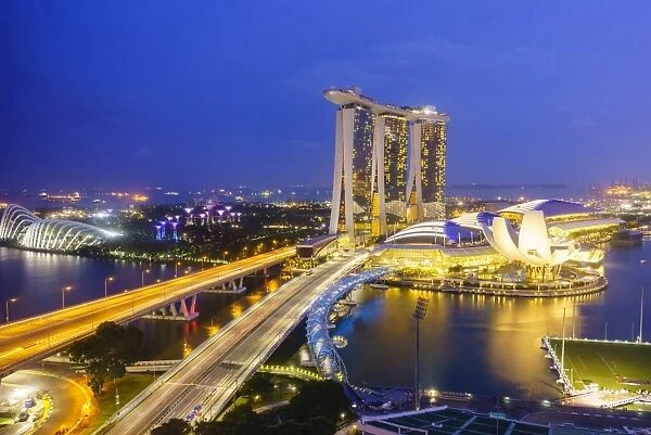 Busy roads leading to the Marina Bay Sands, Gardens by the Bay and ArtScience Museum at night