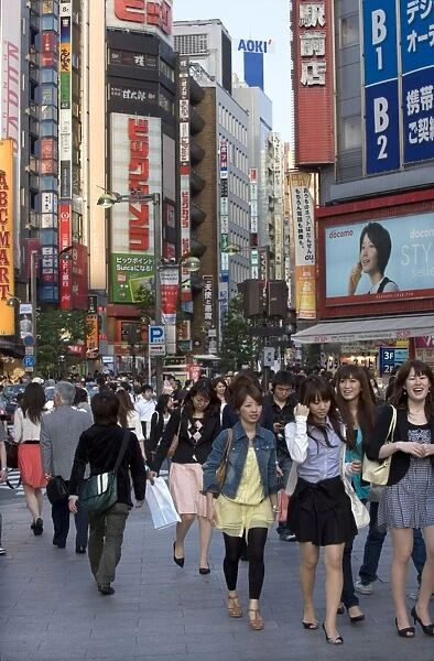 Busy shopping district along Shinjuku-dori Street near East Shinjuku train station