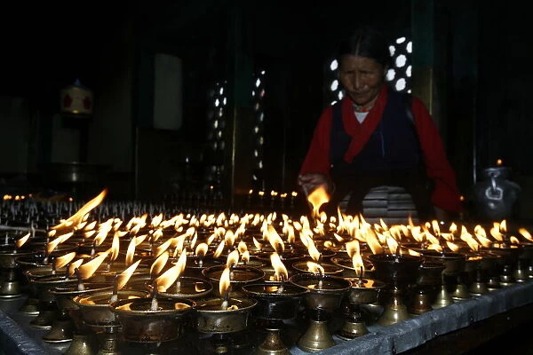 Butter lamps, Swayambhunath temple, Kathmandu, Nepal, Asia