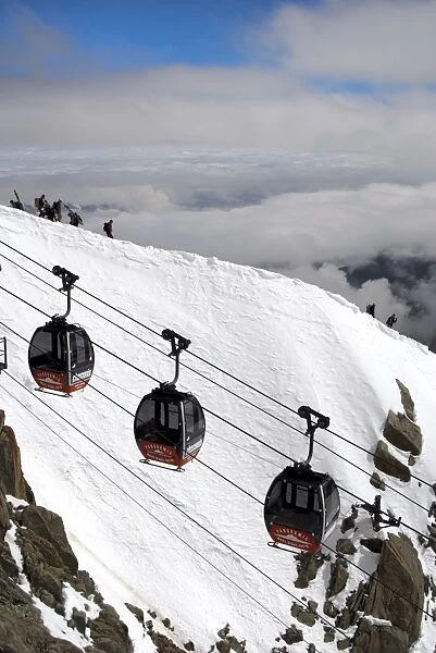 Cable cars approaching Aiguille du Midi summit, Chamonix-Mont-Blanc, French Alps