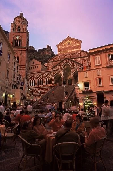 Cafe and cathedral at dusk