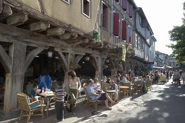 Cafe and half-timbered buildings, Place de la Couverts, Mirepoix, Ariege