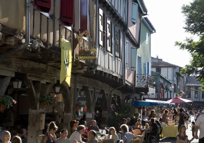 Framed Print : Cafe and half-timbered buildings, Place de la Couverts, Mirepoix, Ariege Framed Print : Cafe and half-timbered buildings, Place de la Couverts, Mirepoix, Ariege