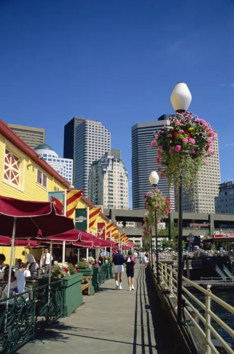 Framed Print : Cafes on Pier 56 on the waterfront with tower blocks