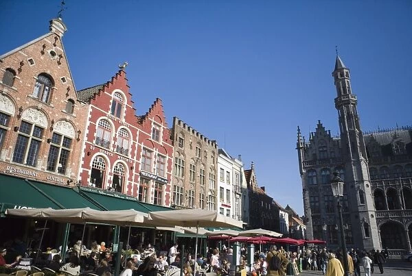 Cafes and restaurants in Main Square (Markt), Bruges, Belgium, Europe