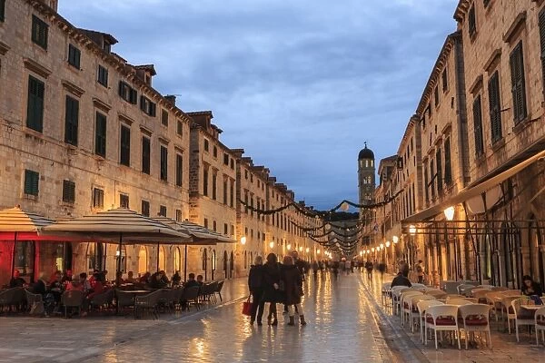 Cafes on Stradun (Placa), pedestrian promenade, evening blue hour, Old Town, Dubrovnik