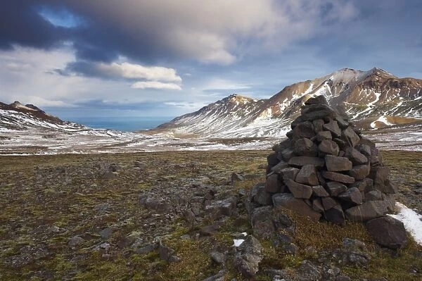 Cairn and mountains in Brunavik valley, a favourite for hikers, Borgarfjorur Eystri fjord