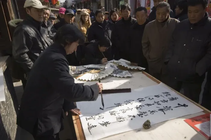Framed Print : Calligraphy artist in a local neighbourhood hutong, Beijing, China, Asia