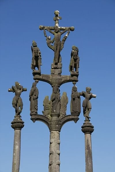 Calvary showing Christ on the cross flanked by two thieves, St. Thegonnec parish enclosure dating from 1610, Leon, Finistere, Brittany, France, Europe