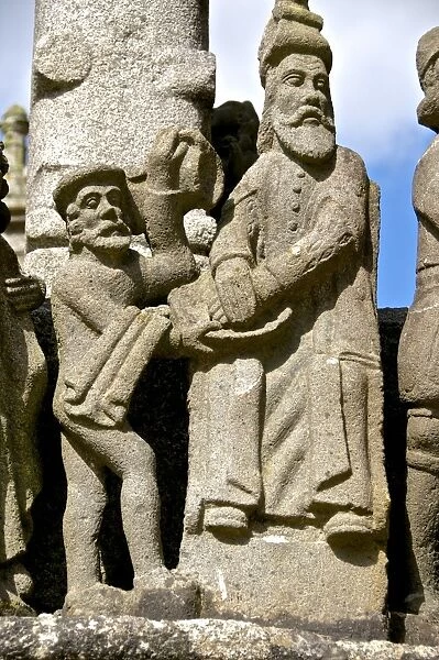 Detail of calvary showing Pontius Pilate washing his hands, , St. Thegonnec parish enclosure 1610, Leon, Finistere, Brittany, France, Europe