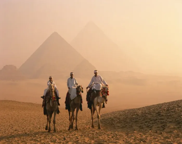 Framed Print : Camel riders at Giza Pyramids, UNESCO World Heritage Site, Giza, Cairo Framed Print : Camel riders at Giza Pyramids, UNESCO World Heritage Site, Giza, Cairo