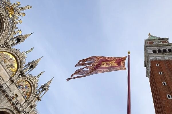 Campanile and Basilica San Marco, St. Marks Square, with Venetian flag
