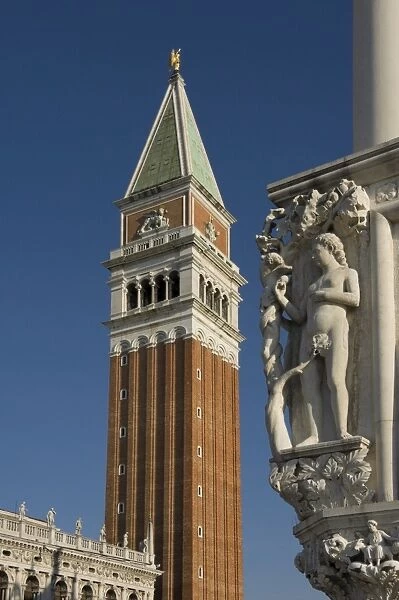 The Campanile with carved stone detail on the Palazzo Ducale, Venice, UNESCO World Heritage Site