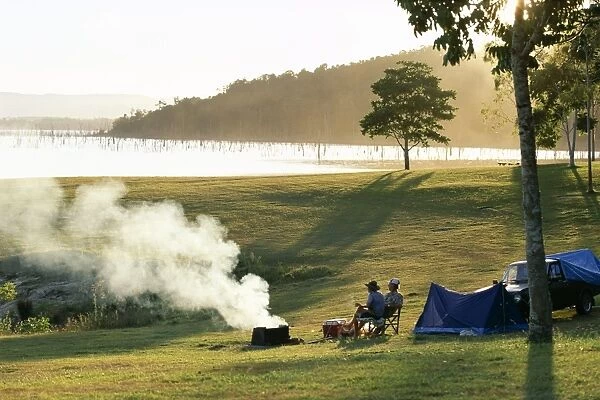 Campers by Lake Tinaroo, a recreation area in the Barron River hydro system on the Atherton Tableland, south west of Cairns, Queensland