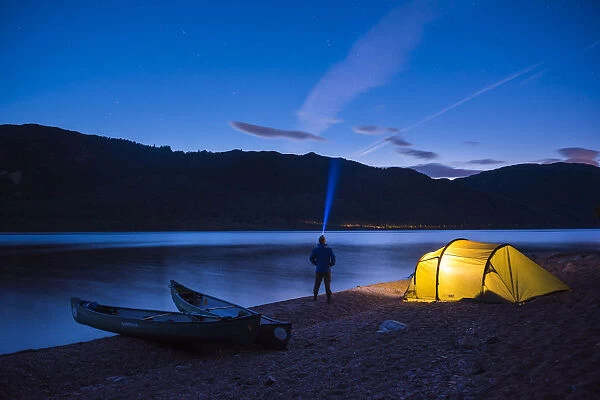 Camping at Loch Ness at night while canoeing the Caledonian Canal, Scottish Highlands