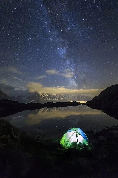 Camping under the stars and Milky Way on the shores of Lac de Cheserys, Chamonix
