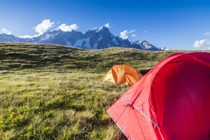 Framed Print : Camping tents in the green meadows with Mont De La Saxe in the background, Courmayeur