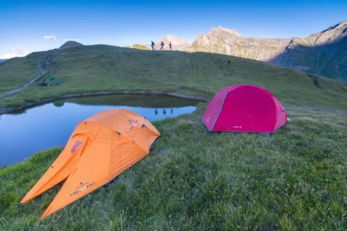 Framed Print : Camping tents and hikers with Mont De La Saxe on the background, Courmayeur, Aosta Valley Framed Print : Camping tents and hikers with Mont De La Saxe on the background, Courmayeur, Aosta Valley