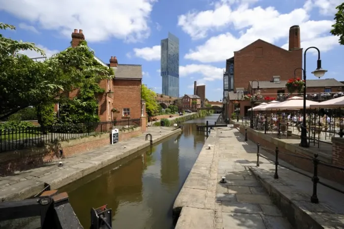 Framed Print : Canal and lock keepers cottage at Castlefield with the Beetham Tower in the background Framed Print : Canal and lock keepers cottage at Castlefield with the Beetham Tower in the background