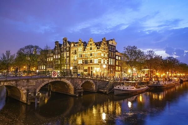 Canal scene at night, Amsterdam, Netherlands, Europe