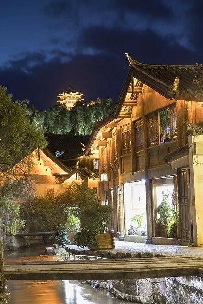 Canalside buildings at dusk, Lijiang, UNESCO World Heritage Site, Yunnan, China, Asia