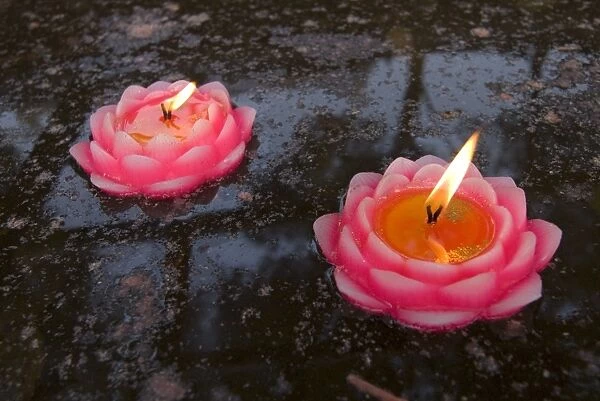 Candle floating in Dafo temple, Leshan, Sichuan, China, Asia