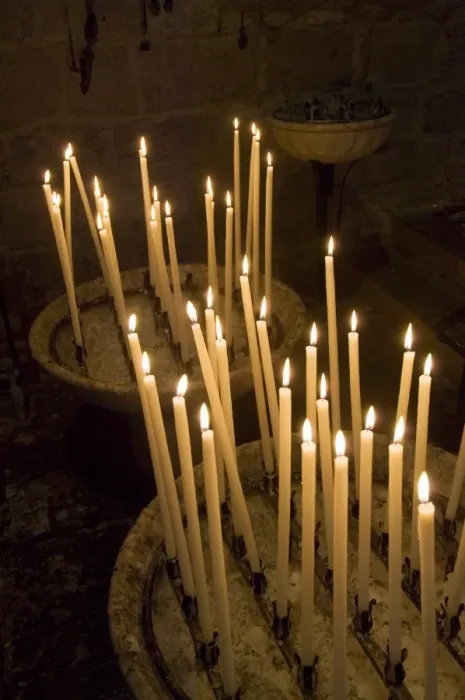 Framed Print : Candles in church, Southern France, Europe Framed Print : Candles in church, Southern France, Europe