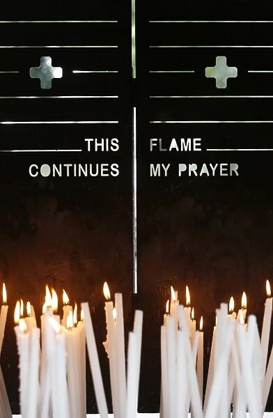 Candles at the Lourdes shrine, Lourdes, Hautes Pyrenees, France, Europe