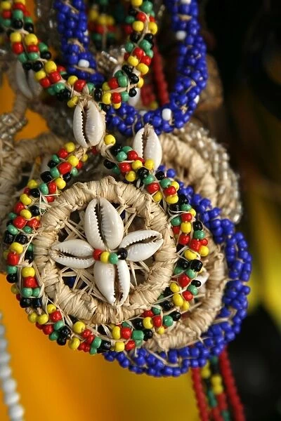 Candomble wear strings of beads made of seeds and shells in the colours of African gods. Cachoeira, Bahia, Brazil