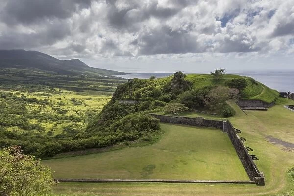 Cannons, ruins and green hills, Brimstone Hill Fortress, UNESCO World Heritage Site, St. Kitts, St. Kitts and Nevis, Caribbean, Central America