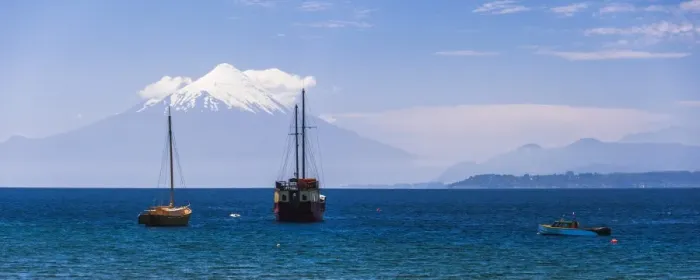 Framed Print : Capitan Hse Traditional Sailing Ship on Llanquihue Lake with Osorno Volcano behind Framed Print : Capitan Hse Traditional Sailing Ship on Llanquihue Lake with Osorno Volcano behind