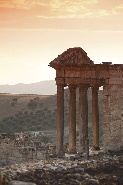 The Capitol at sunset in the Roman ruins, Dougga Archaeological Site, UNESCO World Heritage Site
