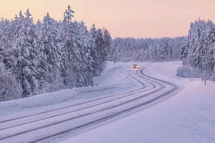 Framed Print : A car driving along a snow-covered road along the Finnish Lapland forest during a winter blue hour, Muonio, Finland, Europe Framed Print : A car driving along a snow-covered road along the Finnish Lapland forest during a winter blue hour, Muonio, Finland, Europe