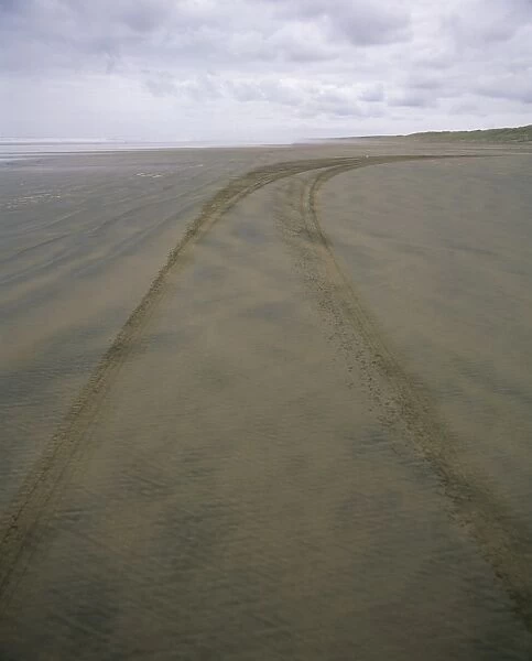 Car tracks along 90 Mile Beach
