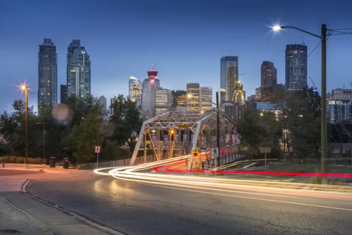 Framed Print : Car trail lights through Macdonal Avenue bridge and Downtown skyline at dusk, Calgary Framed Print : Car trail lights through Macdonal Avenue bridge and Downtown skyline at dusk, Calgary