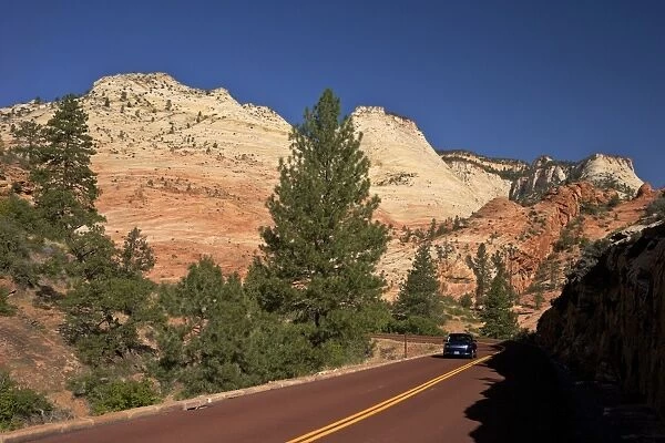 Car travelling on Zion-Mount Carmel Highway, Zion National Park, Utah, United States of America, North America