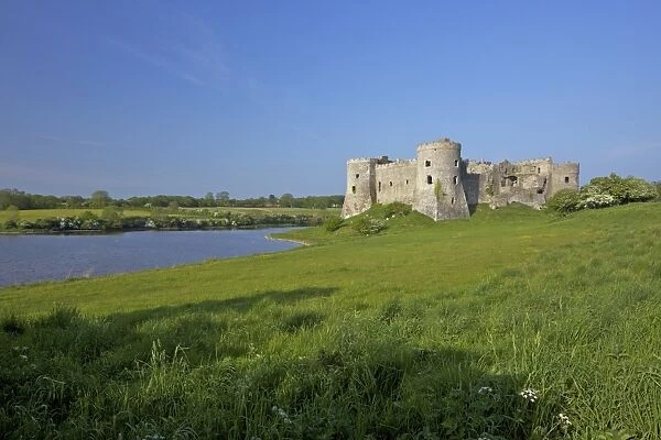Carew ruined castle in spring sunshine, Pembrokeshire National Park, West Wales