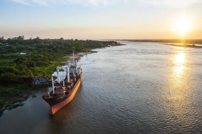 Framed Print : Cargo boat at sunset on the Asuncion River, Paraguay, South America Framed Print : Cargo boat at sunset on the Asuncion River, Paraguay, South America