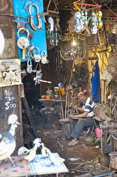 Carpenter and metalworker in his workshop in the souk, Old Medina, Marrakech, Morocco, North Africa, Africa
