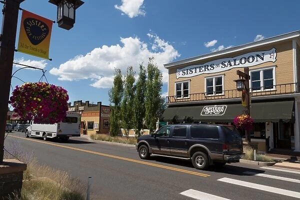 Cars in a traditional street in the historic City of Sisters in Deschutes County