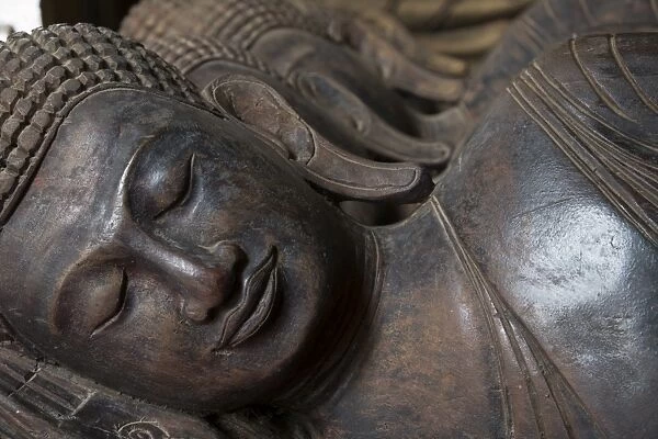 Carved Buddha heads, Phnom Penh, Cambodia, Southeast Asia