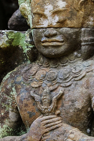 A carved dvarapala entrance guardian stone at the 12th century Preah Khan (Prah Khan)
