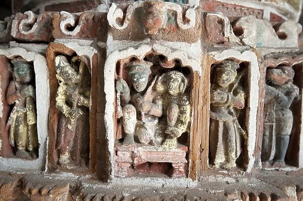 Detail of the carved and painted terracotta work in the Lalji Mandir, one of the terracotta temples at Kalna, West Bengal, India, Asia