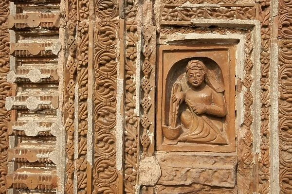 Detail of carved rekha style facade of the 19th century Prataspeswar terracotta temple, built in 1849, Kalna temple complex, West Bengal, India, Asia