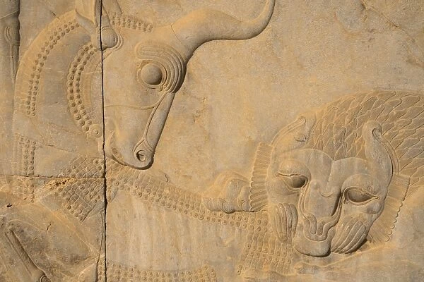 Carved relief of lion overcoming a bull, symbolising the advent of Spring and the Iranian New Year